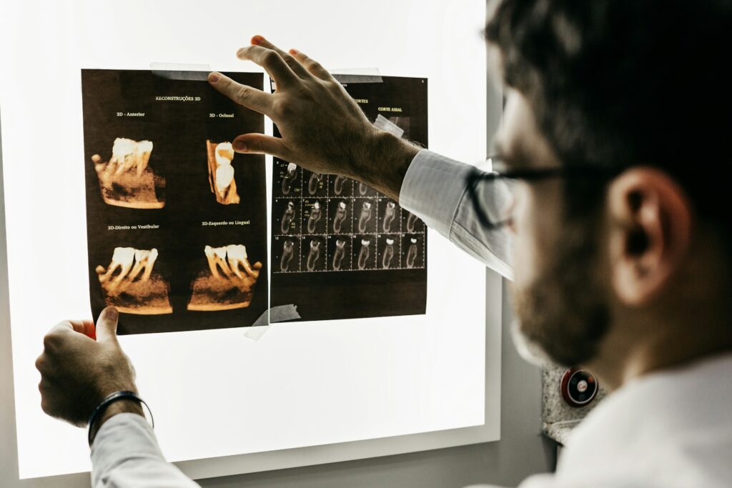 Doctor contemplating which types of braces would be best for a patient